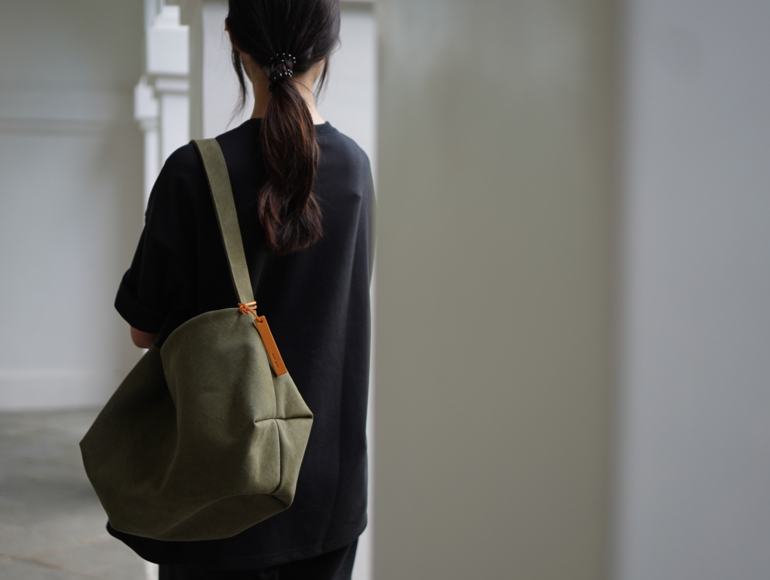 洗舊帆布肩背包