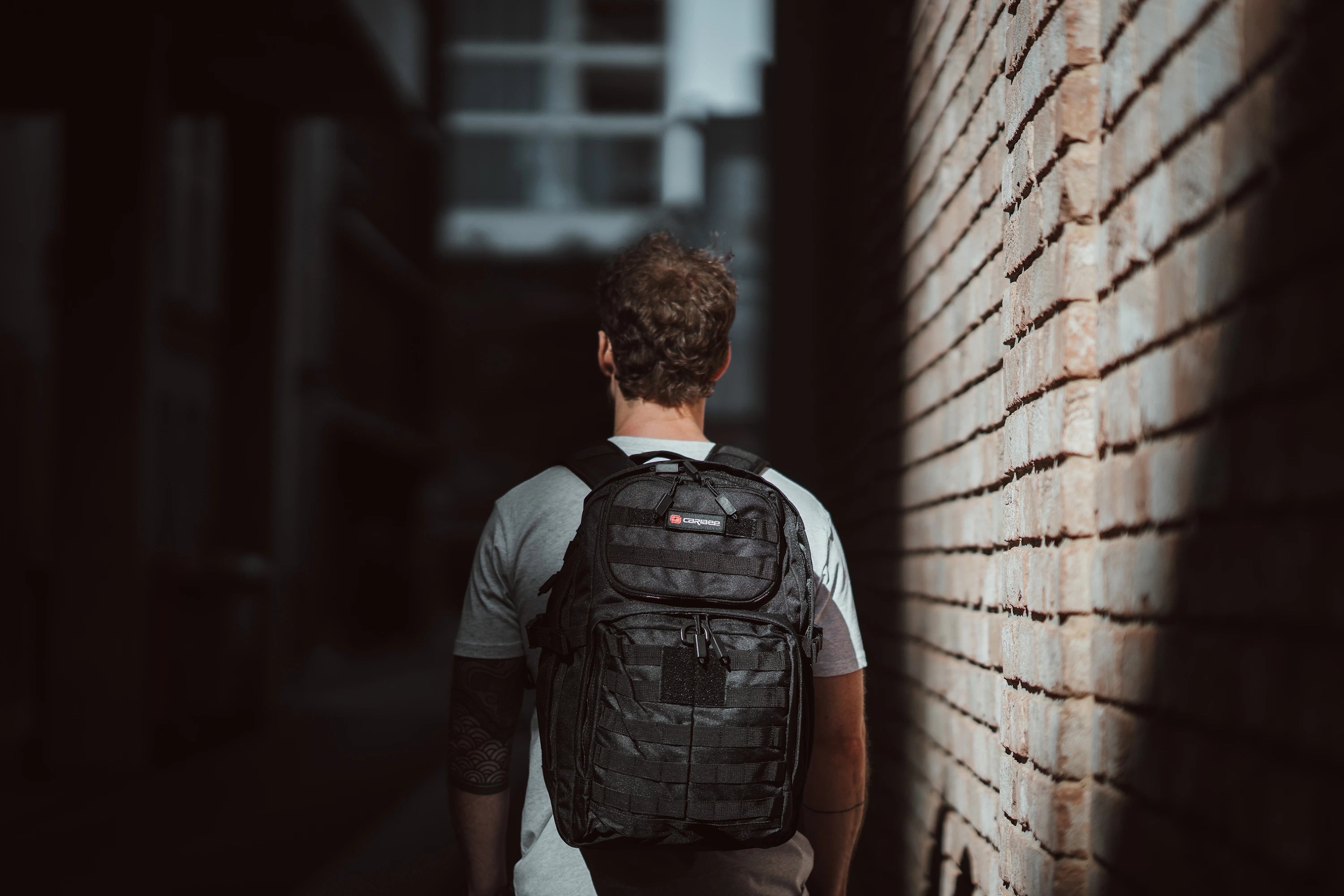 Caribee_Combat_Black_in_alley.jpg